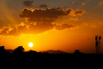 Golden light filling the sky with sunset