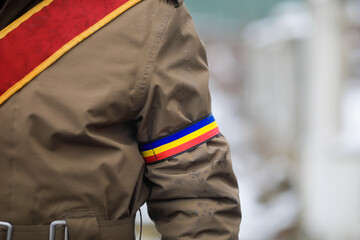 Shallow depth of field (selective focus) with the uniform of a Romanian soldier during an official...
