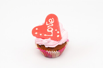 Valentine's Day. Cupcakes with hearts on a white background for Valentine's Day.