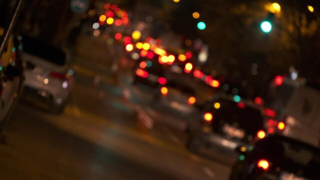 Dutch angle and real time blurry rush hour traffic at Istanbul Bagdat Street at night time