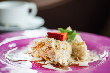 tasty cake with strawberries and mint