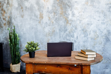 workplace at home, a black laptop is on the table, remote work. home office, interior design, space for creativity
