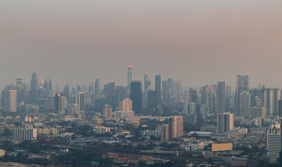 Bangkok, Thailand - Jan 13, 2021 : Aerial view of Beautiful scenery view of Skyscraper Evening time before Sunset creates relaxing feeling for the rest of the day. Selective focus.