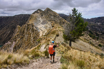 Naklejka na ściany i meble Trekking to Monte Juyende on the crater rim of Laguna Quilotoa, Ecuador
