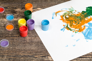 drawing on paper with the help of hands