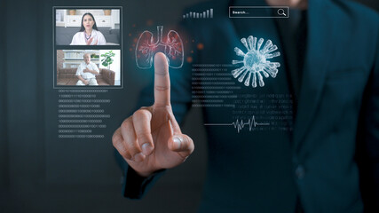 Business man is touching  holographic display with a virtual interface  , doctor analytic patient lungs . Concept of futuristic digital technology. 