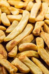 Big french fries. Fried potato chips.