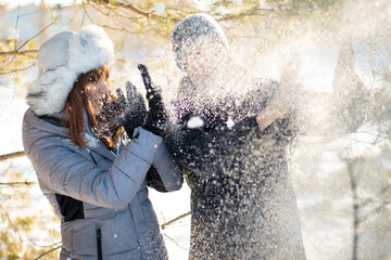Couple were caught in blizzard. Danger in winter forest, selective focus.