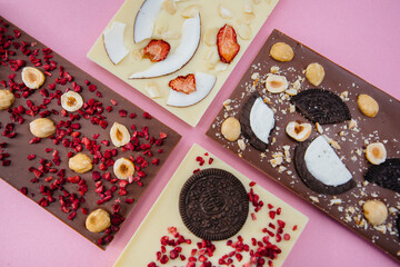 Natural handmade chocolate close-up on a bright background.