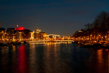 Fototapeta na wymiar Tiny bridge in Amsterdam the Netherlands at sunset at the Amstel