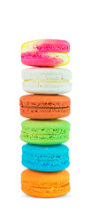 Multicolored macarons set vertekally isolated on a white background.
