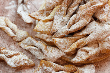 Faworki (angel wings) sprinkled with powdered sugar - traditional Polish carnival delicacy