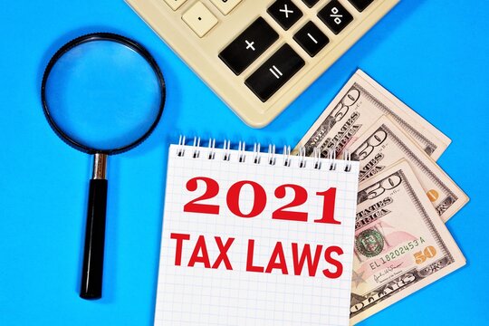 Tax Laws 2021. Text inscription on the planning form. New regulatory legal acts, transformation of the tax system.