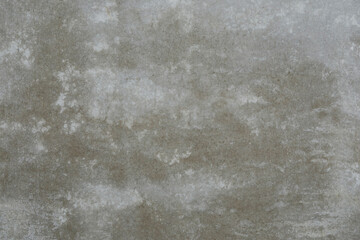 Grey cement wall with cracked surface, empty wall for a banner or background, space for text  no person