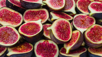 Fototapeta na wymiar Tasty figs background. Top view.