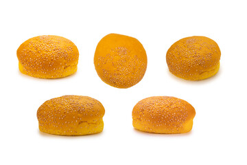 Yellow burger bread isolated on white.