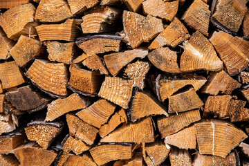 Firewood arranged neatly. Texture for backgrounds.