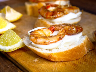 fried shrimp laying on a sandwich