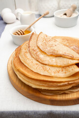 Homemade thin pancakes for breakfast or dessert. Traditional dish for Shrovetide.