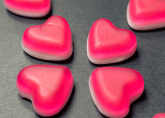 Close-up of pink and white heart shaped sweets