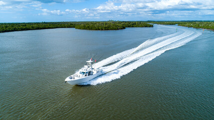 Boat going through intercoastal waterway