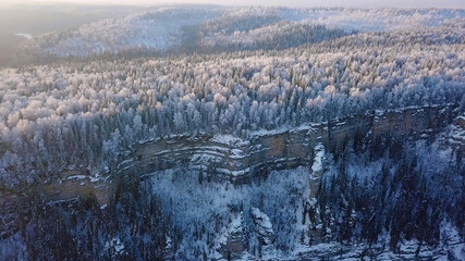 Snow-covered Russian forest, Mount Gubakha, Perm. Aerial panoramic view of russian nature. View from the Drone	
