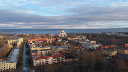 Fototapeta na wymiar Kronstadt, St. Petersburg, Russia. Aerial panoramic view of russian city. View from the Drone, Flying over Point of interest 