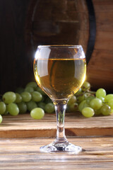 Still life with white wine and grapes