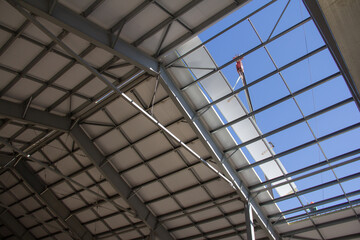 Obraz premium The use of modern building materials. Sandwich panels on the wall of the building. Insulation of the frame of the building sandwich panels.