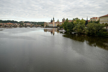 Prague, Czech Republic - September 15, 2015: Vltava river in Prague. Vltava is the longest river within the Czech Republic. Charles bridge.