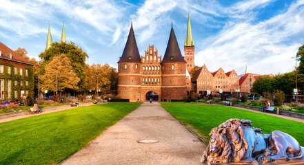 The Holsten Gate or Holstentor in Lübeck old town on a sunny day. Germany, Schleswig-Holstein.