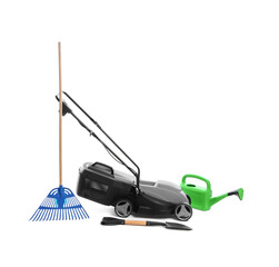 Modern electric grass cutter and gardening tools on white background