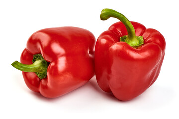 Red ripe bell peppers, isolated on white background