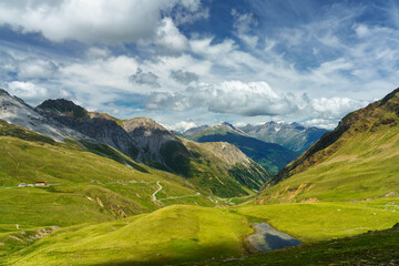 Fototapeta na wymiar Mountain landscape along the road to Stelvio pass (Lombardy) at summer