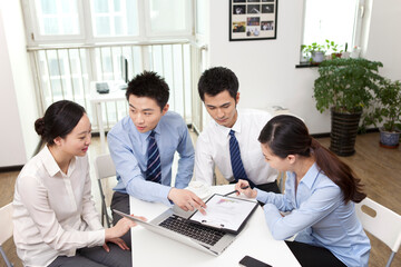 Fototapeta premium Group of business people discussing in office