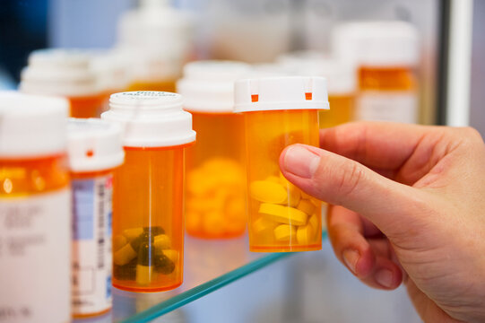 Pill Bottles On Shelf