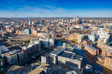 Aerial photo of the Leeds City Centre taken from the area known as The Leeds Dock taken in the winter time in a bright day