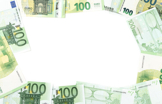 Hundred euro bills over white background with copy space