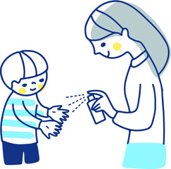 男の子の手のひらにアルコール除菌スプレーをする母親
