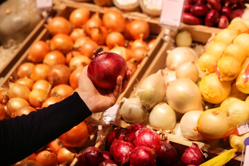  buying fruits and vegetables at the market.