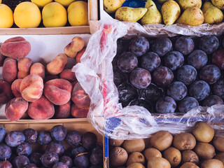 different fresh fruits in a grocery store