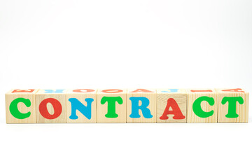 word contract made of colored cubes on white background