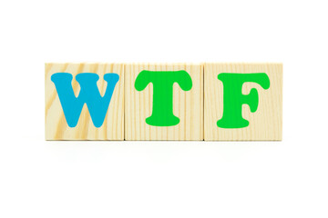 word wtf made of colored cubes on white background