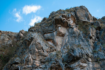 Naklejka premium Stone Walls and Rocky Mountains on a Sunny day in Suesca, Cundinamarca Colombia where many climbers go to practice