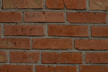 The wall is a lady of red brick.