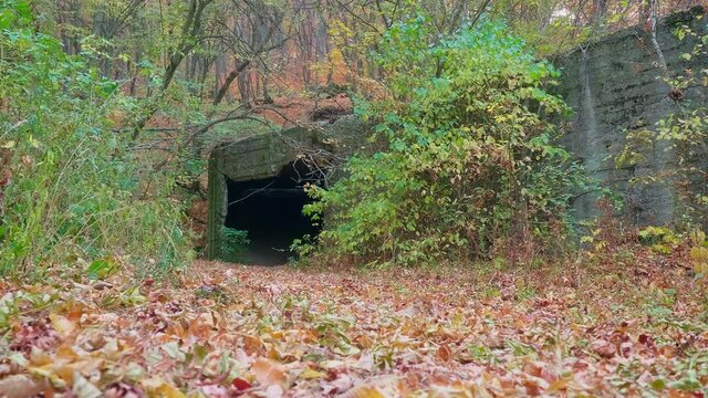 Side view of abandoned and closed and ruined entrance into tunnel of mine where Uranius was being mined. Lermontov city and Stavropol Krai.