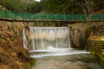 Small dam with waterfall in Park