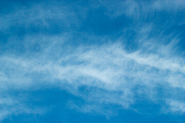 Blue sky with cirrus cloud. Summer day nature background