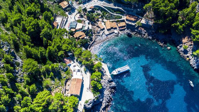 Drone shot of blue sea Sa Calobra, Majorca, Torrent De Pareis, Sierra De Tramuntana, Balearic Islands, Spain