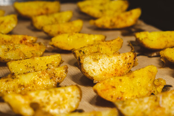 Baked potatoes in the oven close-up